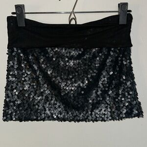 Black sequined mini skirt with mesh at the top. Size M